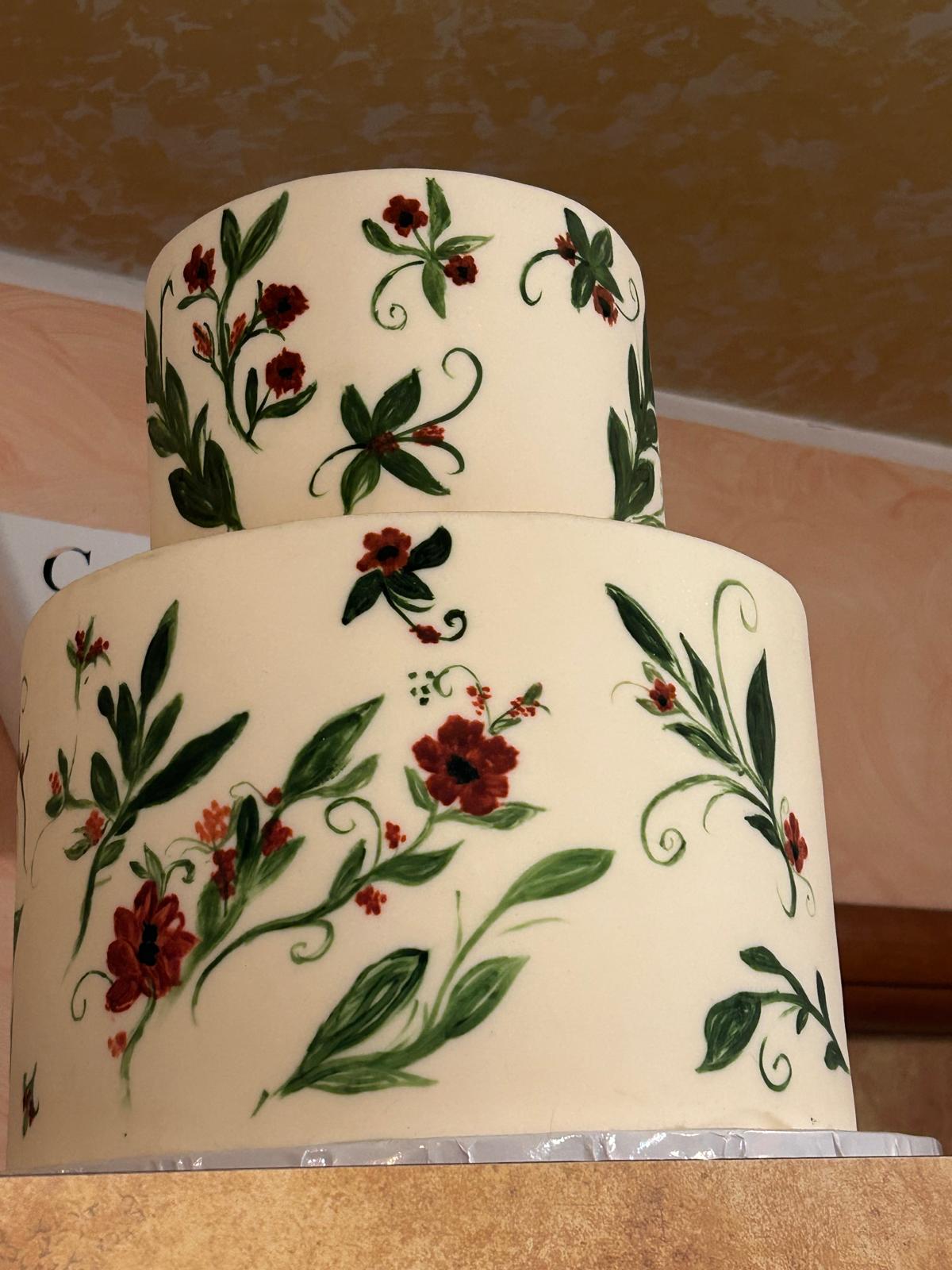 Torta a due piani con fiori dipinti